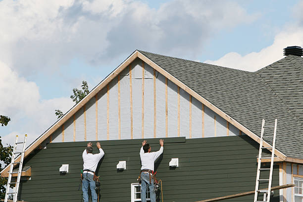Professional Siding Replacement technician working in Quarryville, PA